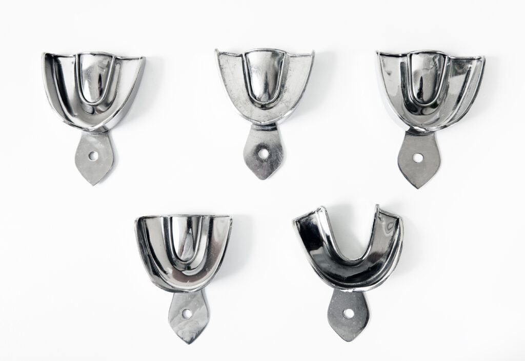 metal impression tray isolated on white background metal impression tray isolated on white background