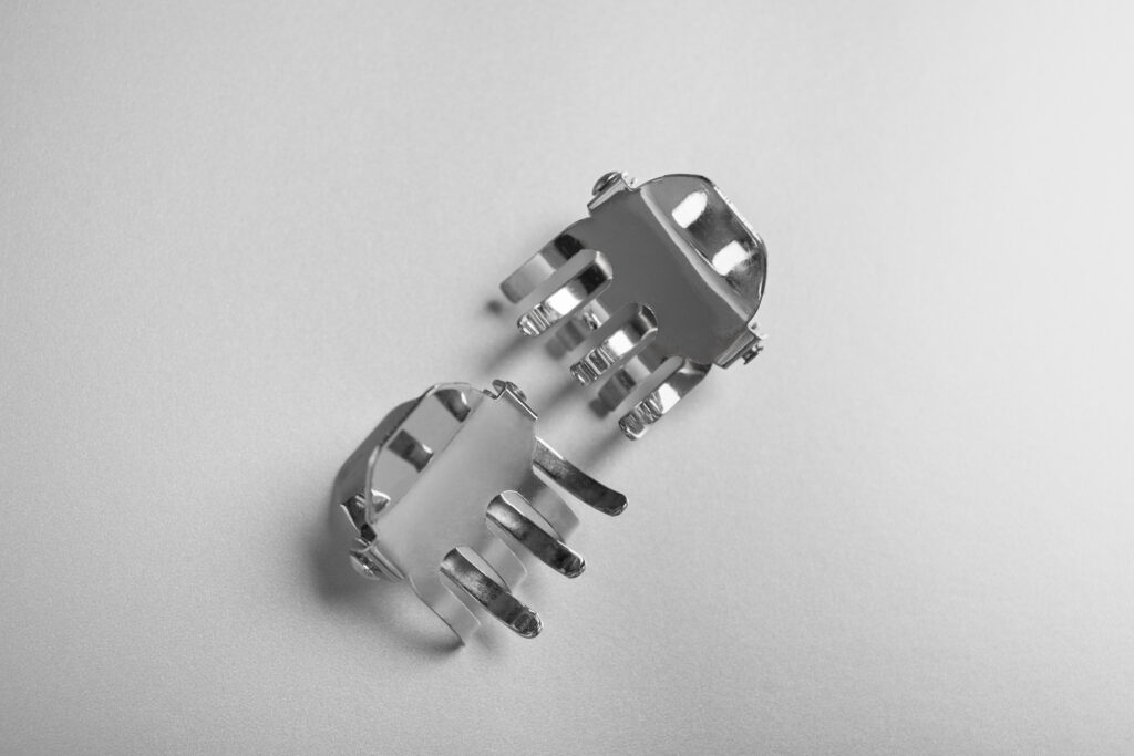 silver aesthetic wallpaper with hair clips